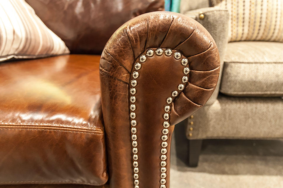 Closeup view of leather chair.